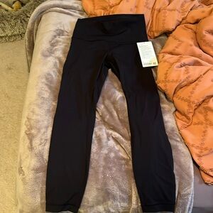 NWT Lululemon black wunder under leggings size 6